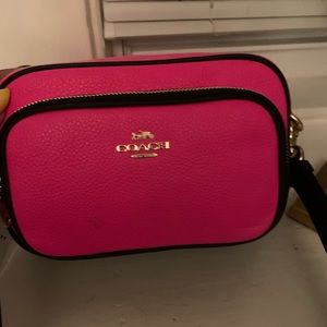 Hot pink and black Coach crossbody